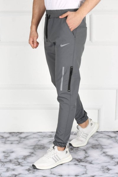 Fermuarlı Diz Cepli Fosfor Detaylı Nike Pantolon